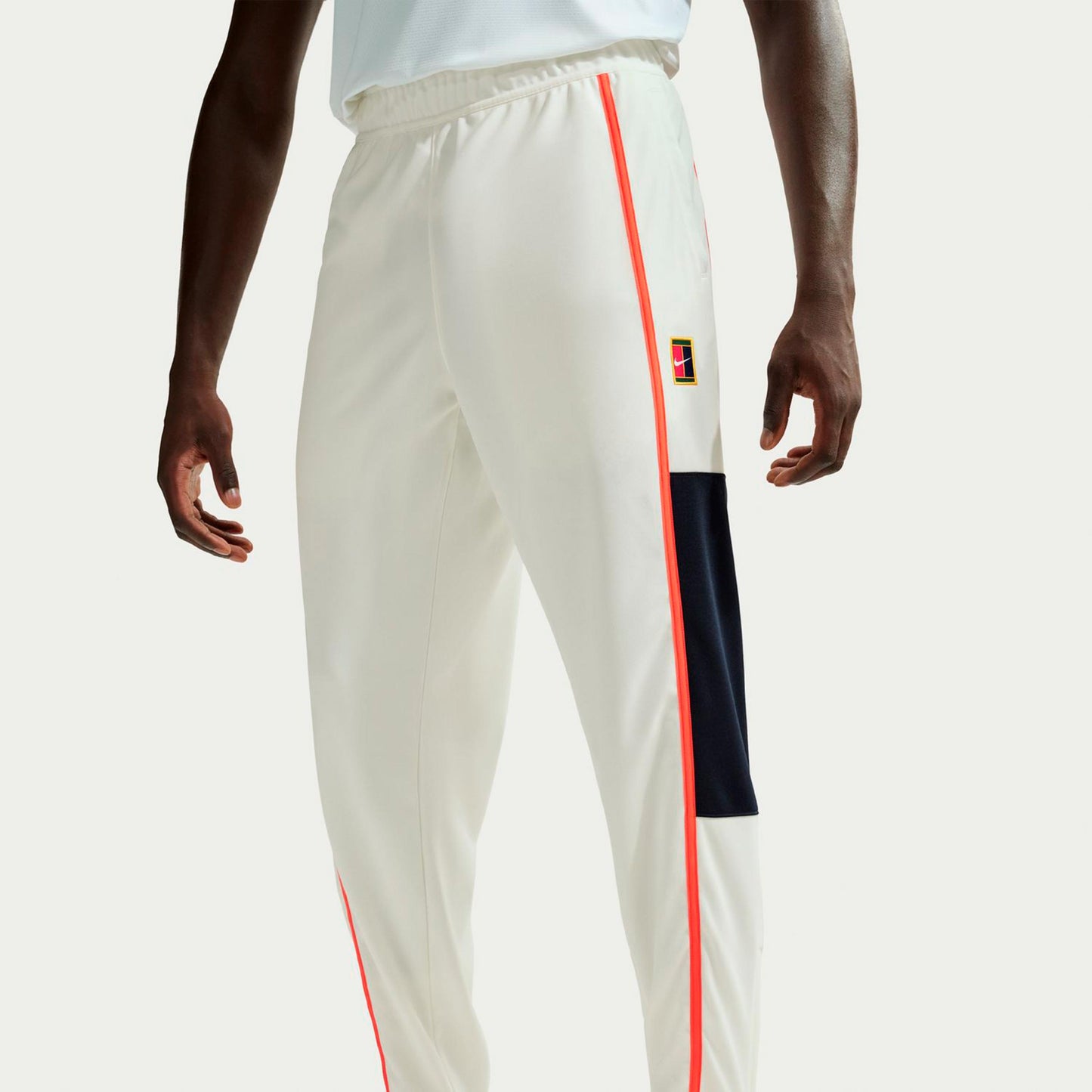 Nike Court Heritage Pantalon survêtement Hommes-crème, orange