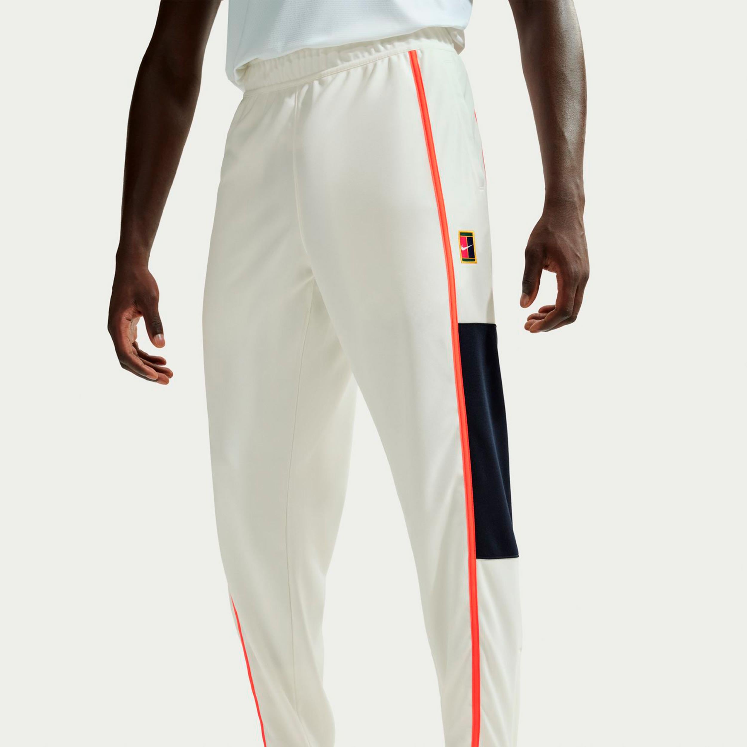 Nike Court Heritage Pantalon survêtement Hommes-crème, orange