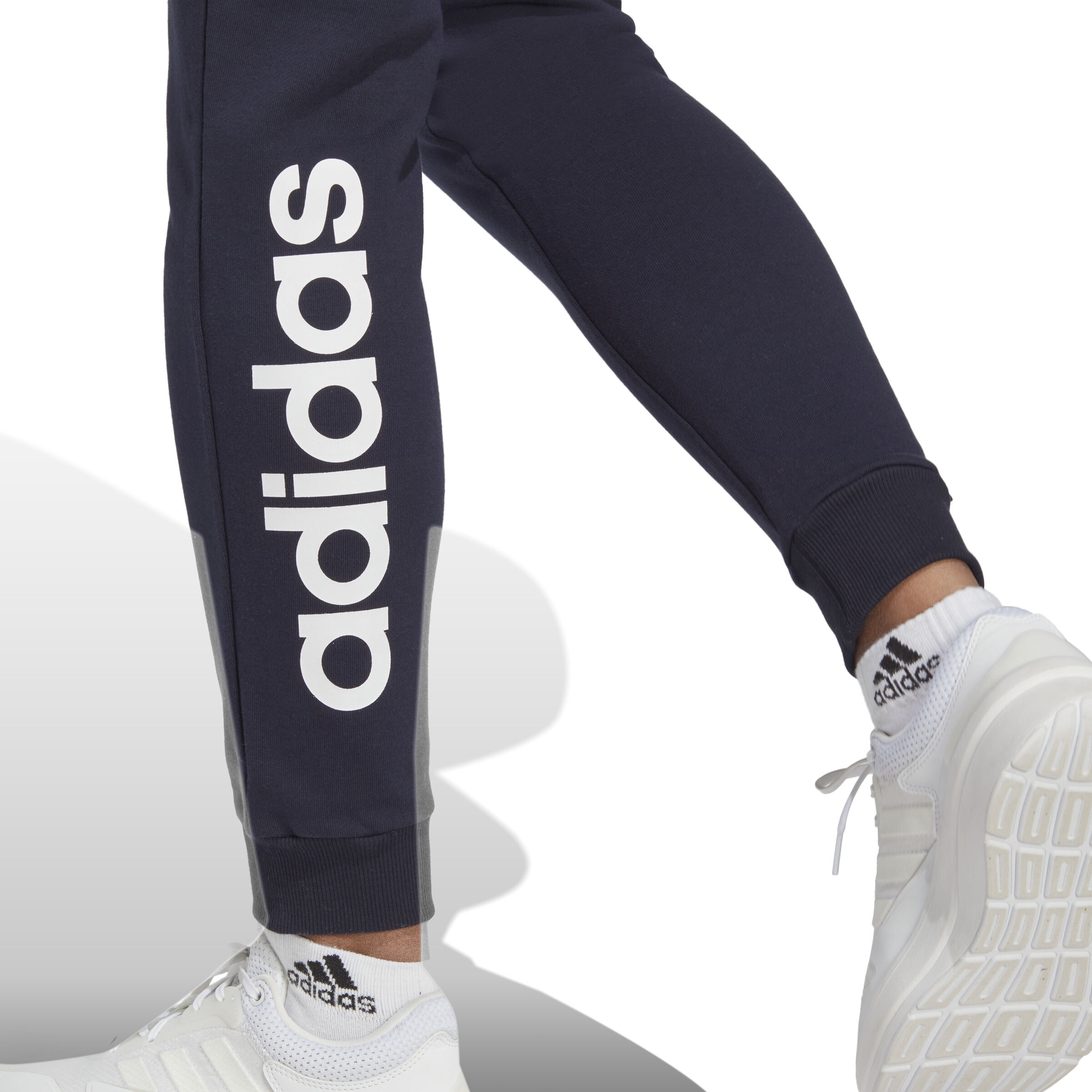 Buy adidas Essentials Linear French Terry Cuffed Pantalon Survetement Femmes Bleu Fonce Blanc online Tennis Point FR